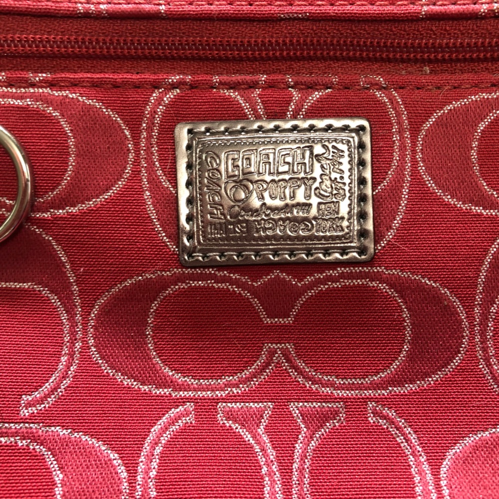 Pink and red logo print Coach wristlet